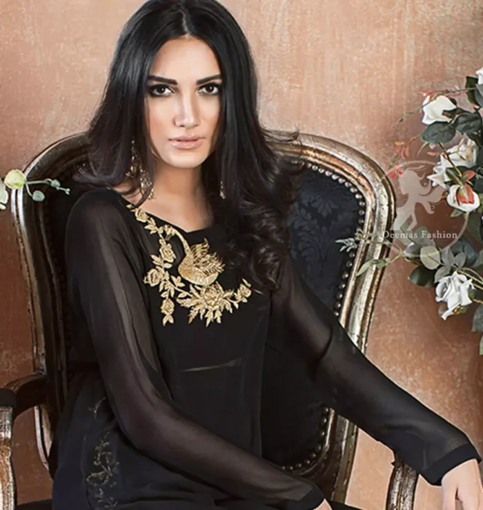 A must have creation for day to evening wear. Exhibit elegance in this black straight shirt enhanced with antique kora and dabka embroidery adorned with Swarovski crystals and zardozi. This shirt is made up of chiffon fabric and paired up with black raw silk bell bottom. This outfit is coordinated with banarsi jamawar dupatta.
