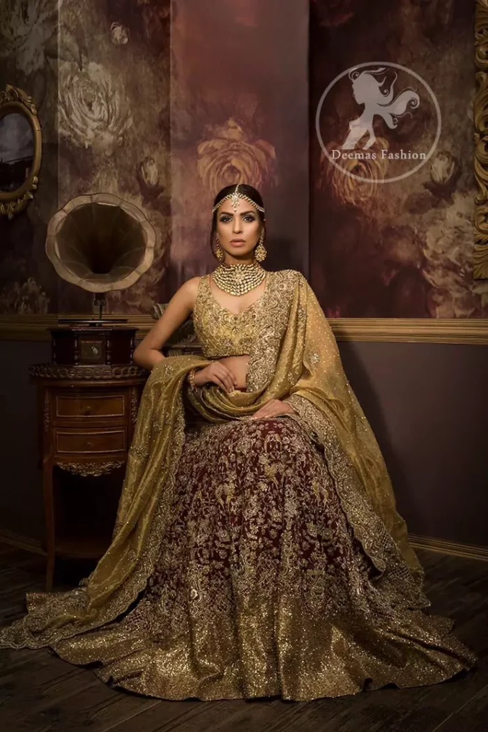 The blouse features marvellous and awesome embellishments accent all over the front and back. Concealed hooks closure front. Dusty gold applique work border implemented at the bottom of the lehenga. Dupatta has a four-sided embroidered border all around and contains medium and large-sized ornamental motifs crafted all over. Pearls and sequins spray all over with Scalloped edges finished.