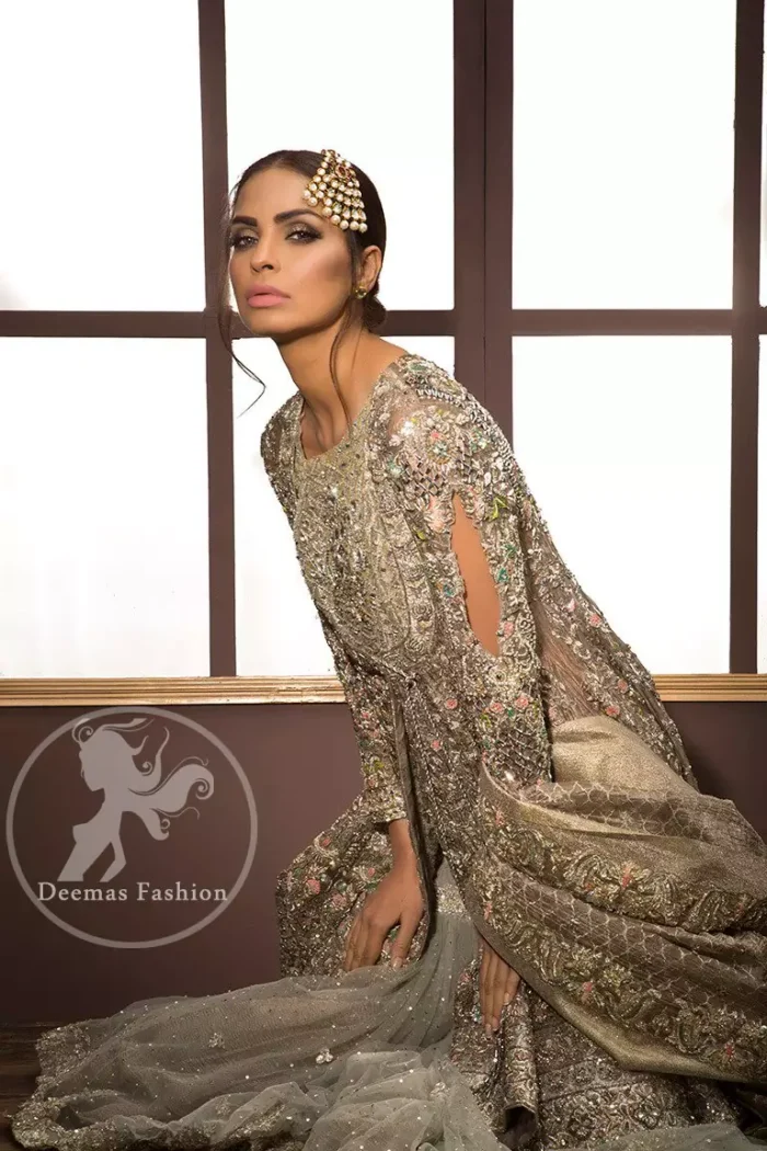 The shirt features beautiful and lovely embellishments that accentuate the neckline, all over the bodice, the front flared, and a working border on the hemline