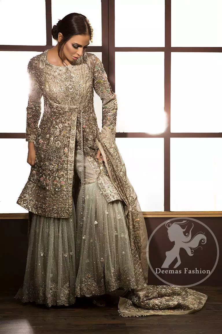 The shirt features beautiful and lovely embellishments that accentuate the neckline, all over the bodice, the front flared, and a working border on the hemline