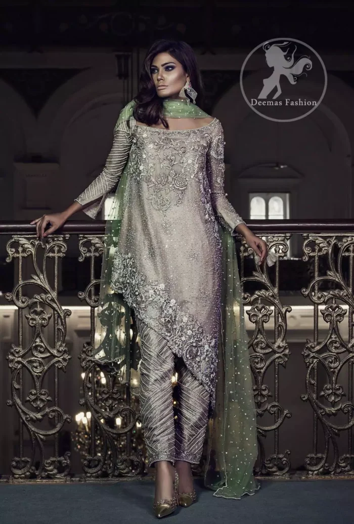Features marvellous and awesome embellishments accent on the front. Full-length sheer Embellished sleeves and Concealed with back zip closure. Dupatta contains pearls and sequins sprayed all over.