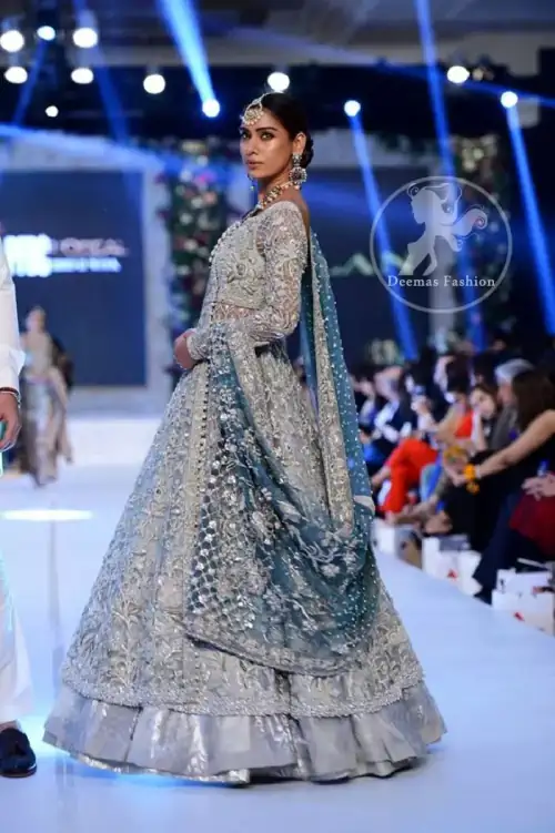 Silver Gray Bridal Frock. The frock features marvellous and awesome embellishments accenting all over the front and back Full-length sheer