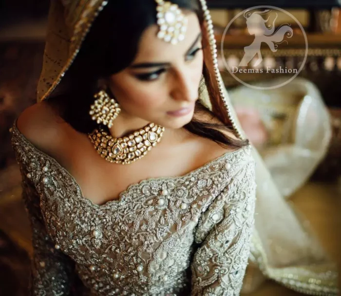 The frock has been adorned with a fully embroidered bodice. The frock features beautiful and fabulous embellishment front and back. The dress contains a working border on the hemline. Compliment with embellished waist belt. Dupatta has a four-sided embroidered border.