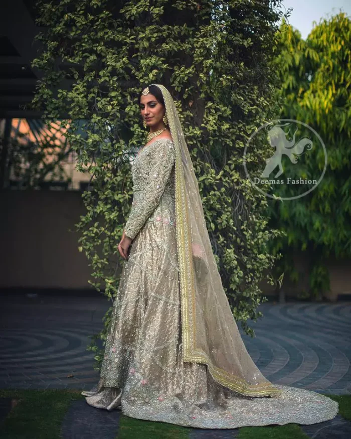 The frock has been adorned with a fully embroidered bodice. The frock features beautiful and fabulous embellishment front and back. The dress contains a working border on the hemline. Compliment with embellished waist belt. Dupatta has a four-sided embroidered border.