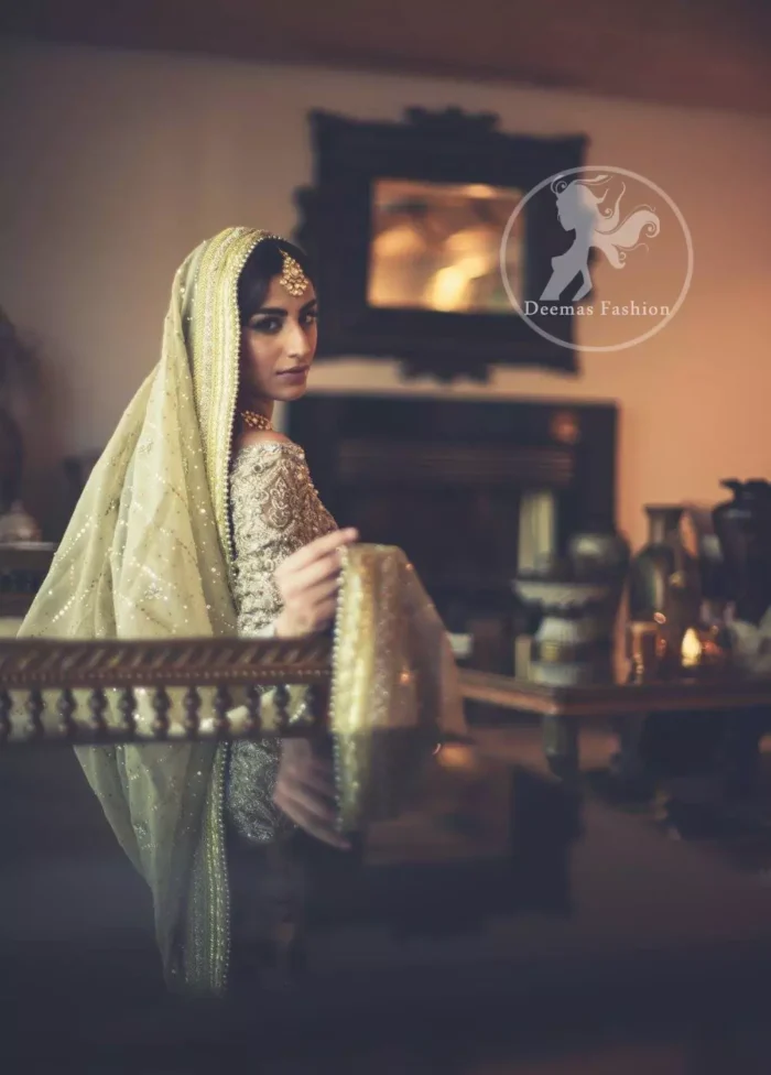 The frock has been adorned with a fully embroidered bodice. The frock features beautiful and fabulous embellishment front and back. The dress contains a working border on the hemline. Compliment with embellished waist belt. Dupatta has a four-sided embroidered border.