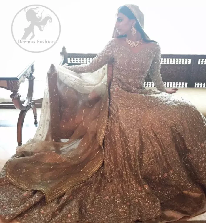 The frock has been adorned with a fully embroidered bodice. The frock features beautiful and fabulous embellishment front and back. The dress contains a working border on the hemline. Compliment with embellished waist belt. Dupatta has a four-sided embroidered border.