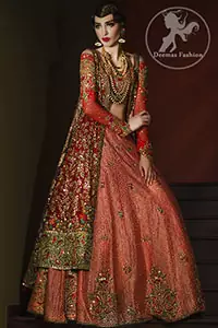The gown has been adorned with embellishments accent all over. The gown contains an embellished border on the hemline. Pure Banarsi Jamawar Lehenga has been adorned with antique embroidery at the hemline.