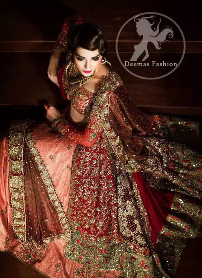The gown has been adorned with embellishments accent all over. The gown contains an embellished border on the hemline. Pure Banarsi Jamawar Lehenga has been adorned with antique embroidery at the hemline.