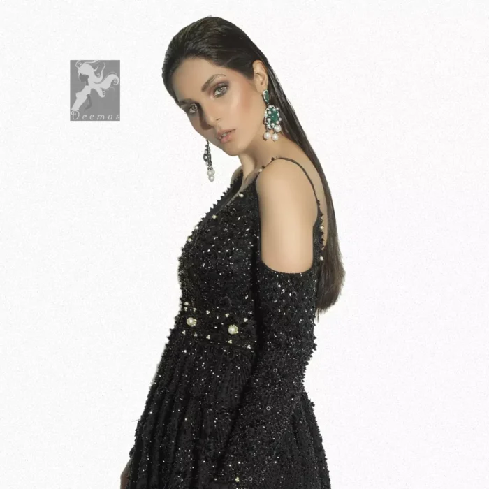 Black peplum having matching black embellishment all over peplum and trousers. Peplum comes with fully finished matching dupatta.