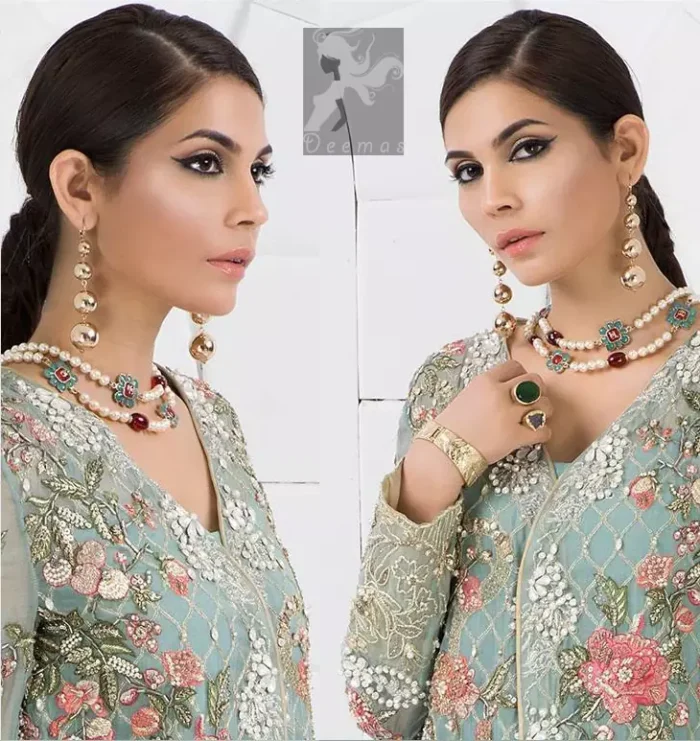 Cascade embroidered chiffon without slits shirt adorned with colorful embellishment. Shirt comes with Opal raw silk trousers and pure crinkle chiffon dupatta.
