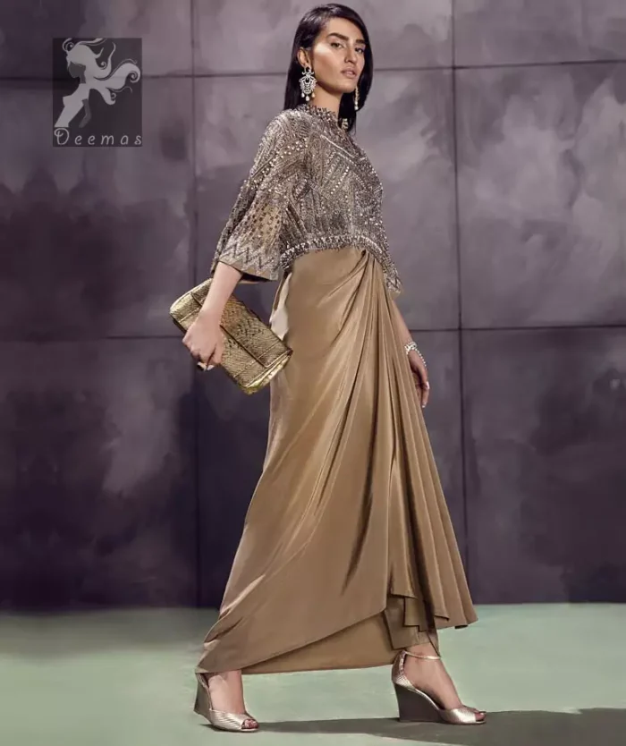 Fawn brown silky maxi has embellished bodice and sleeves. Bodice and sleeves have been embellished with dark gray embellishment and ivory pearls.