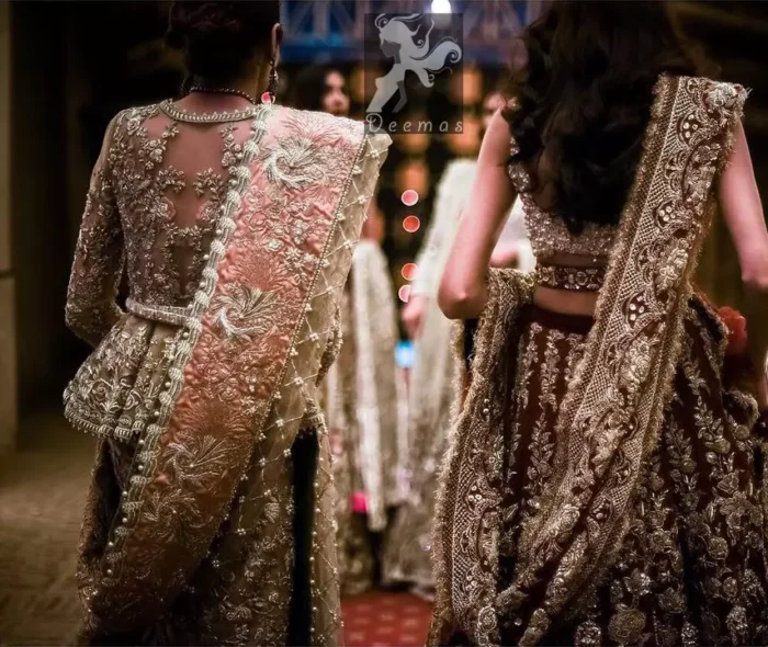 Fawn short length peplum made with net having embellished belt on waist. Large embellished border having peach appliqued on dupatta. Dupatta is adorned with rectangular shapes of embellishment small motifs all over it. Fitted lehenga having extra layer above the knees.