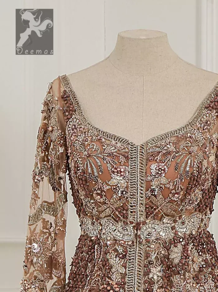 Light brown front open net maxi having brandy rose bodice. Maxi adorned with brown, light golden, champagne and silver embellishment. Pure organza dupatta adorned with embellished border.