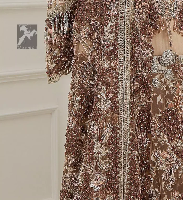 Light brown front open net maxi having brandy rose bodice. Maxi adorned with brown, light golden, champagne and silver embellishment. Pure organza dupatta adorned with embellished border.