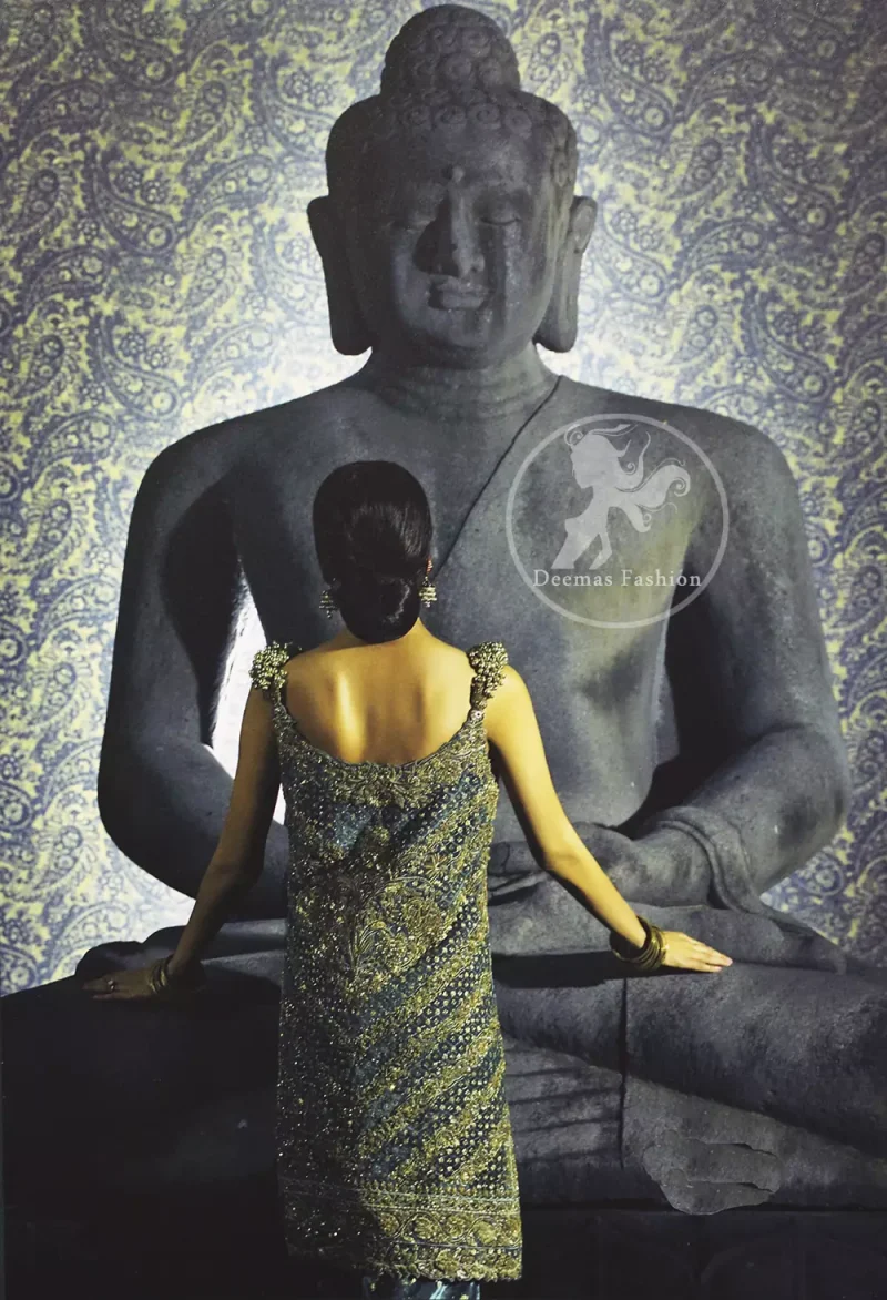 Bluish Slate Gray velvet shirt has been adorned with antique shades of embellishment.Embellished 3d motifs has been applied on shoulders. Brocade lehengha / skirt having embellished border on the hemline.