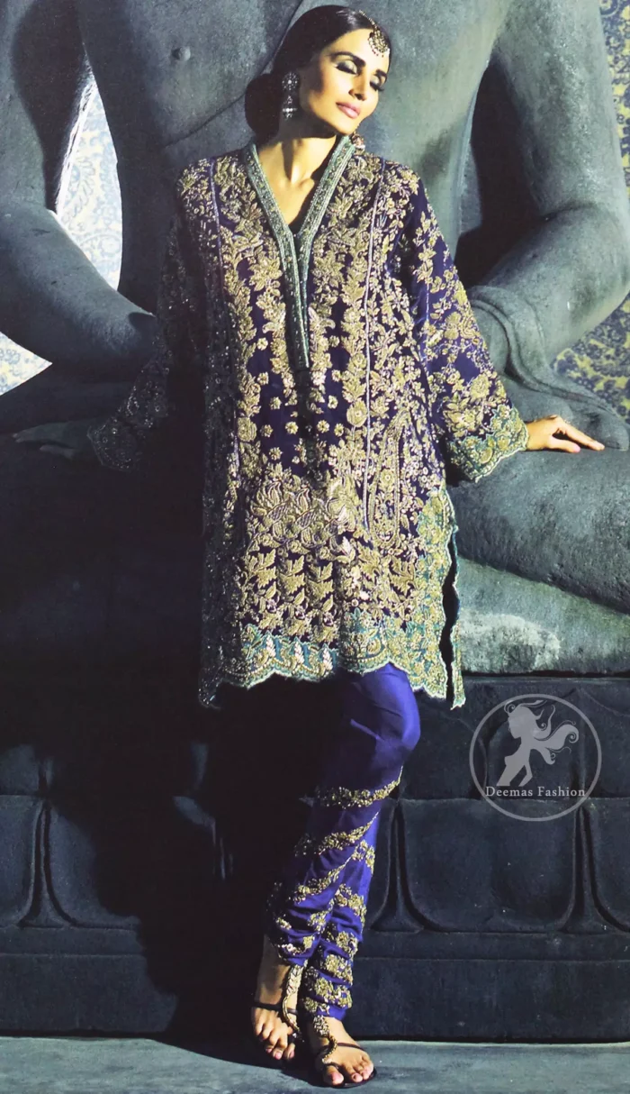 This classic shirt is reflecting exuberant colours. Kurta style shirt meticulously highlighted with antique kora, dabka, pearls and sequins. It has silhouettes adorned with neckline. This shirt is decorated with front and back panels having gorgeous floral embroidery. Shirt is fully scalloped, artfully coordinated with delicate embroidered pajama. It comes with chiffon dupatta decorated with sequins spray all over.