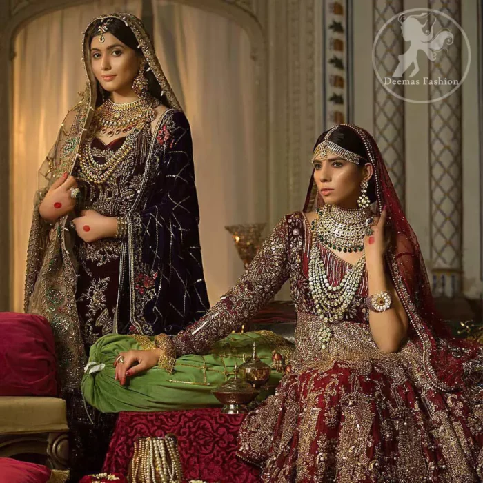 This maroon angrakha frock heavily embellished in the front with silver gold kora dabka, kundan and stones work. One side shoulder neckline is beautifully ornamented with sequins lines in geometric manner. Paired up with matching brocade sharara which looks so magnificent. This outfit is meticulously coordinated with maroon dupatta with embellished borders on lengths.