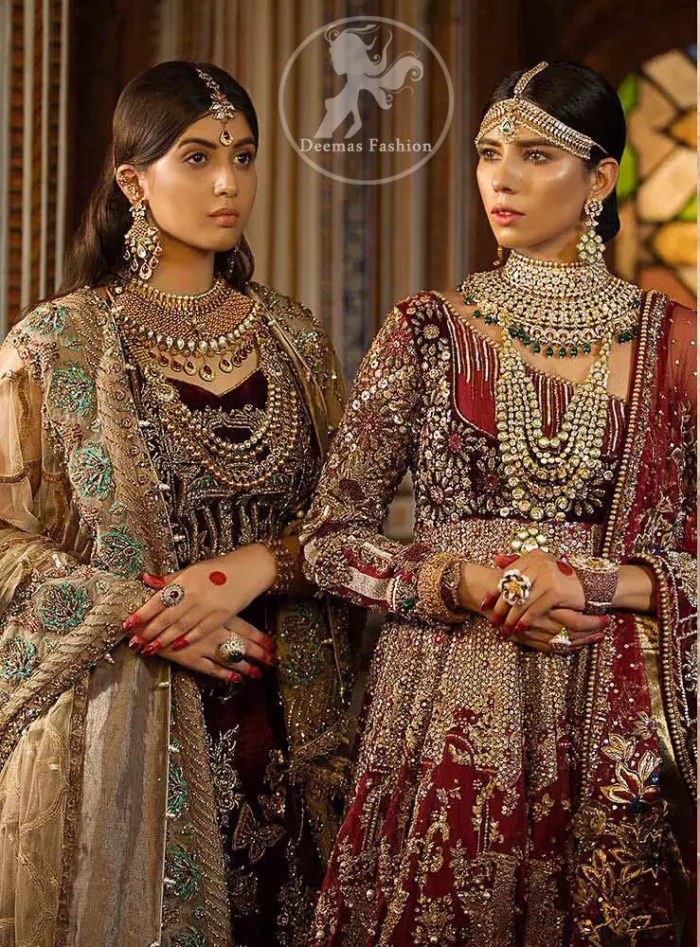 This maroon angrakha frock heavily embellished in the front with silver gold kora dabka, kundan and stones work. One side shoulder neckline is beautifully ornamented with sequins lines in geometric manner. Paired up with matching brocade sharara which looks so magnificent. This outfit is meticulously coordinated with maroon dupatta with embellished borders on lengths.