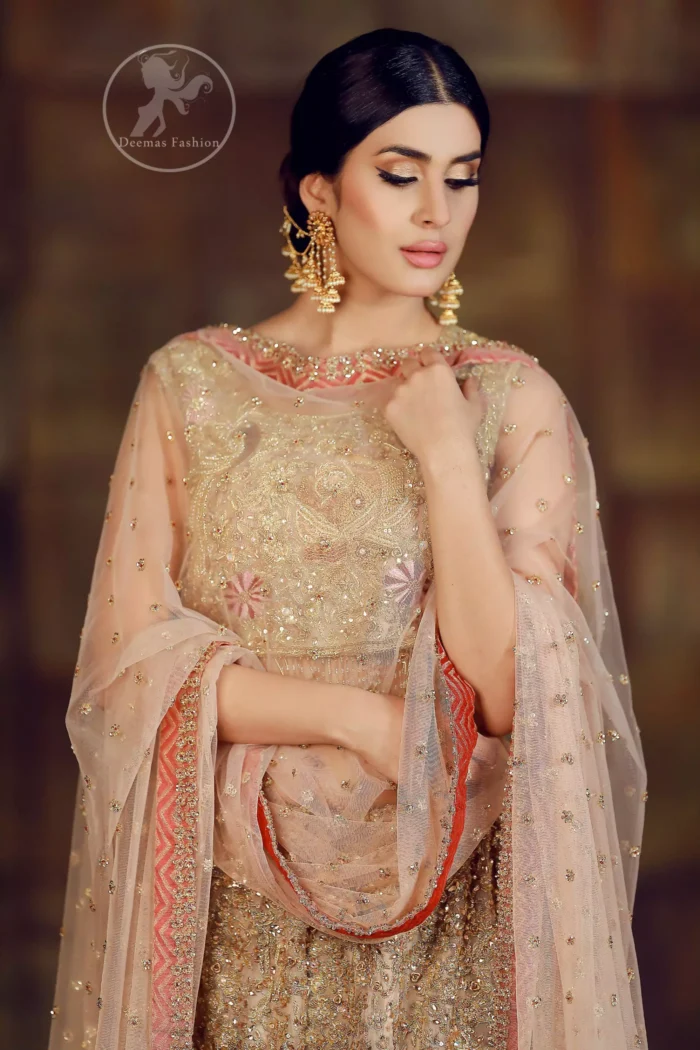 This dress is beautifully sculptured with floral thread embroidery. Blouse is fully embellished and decorated with tassels. Lehengha is embellished with different shaded thread embroidery, allured with kora, dabka, tilla, sequins and pearls.