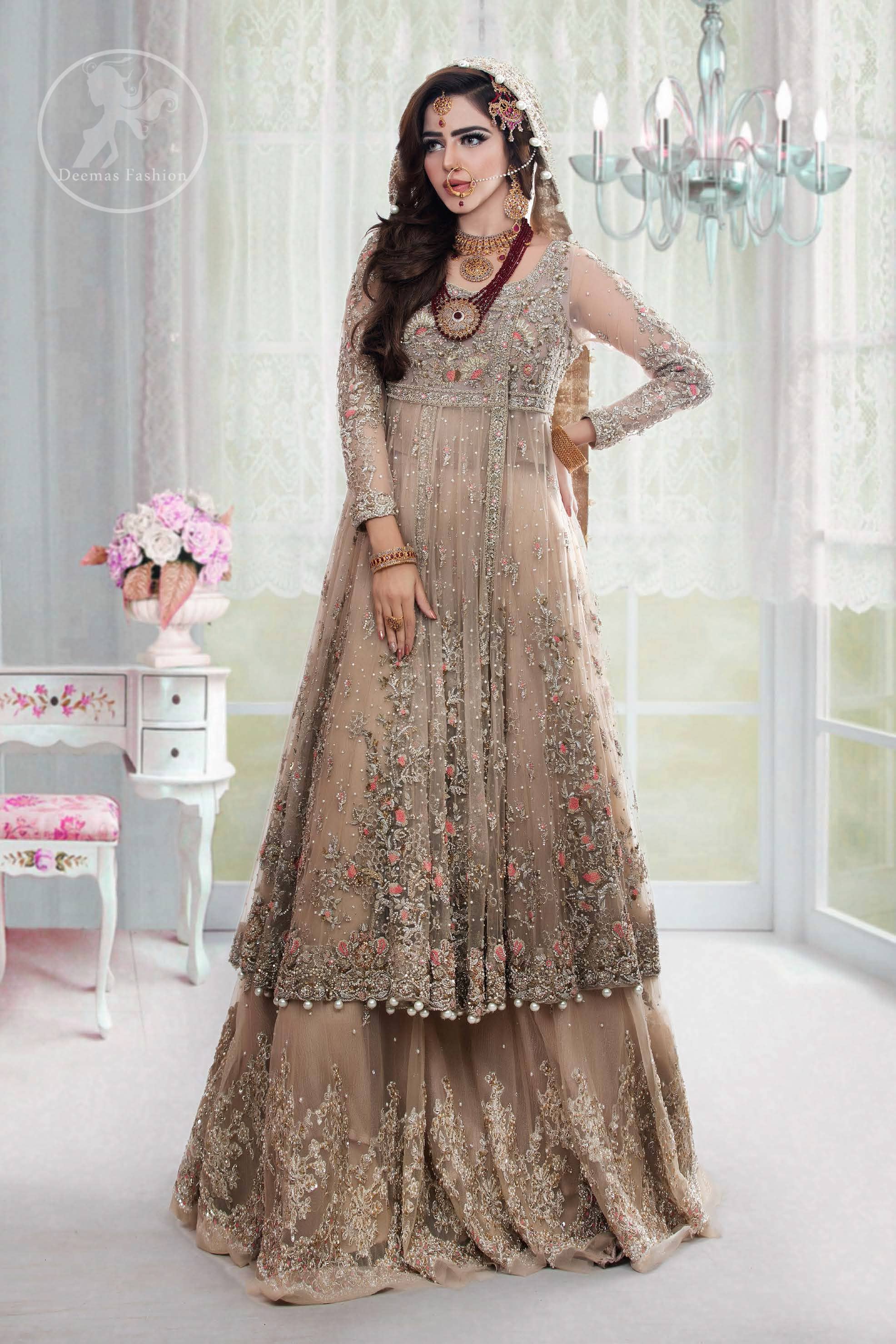 This outfit is meticulously featuring antique shades of kora, dabka, tilla, sequins and pearls.