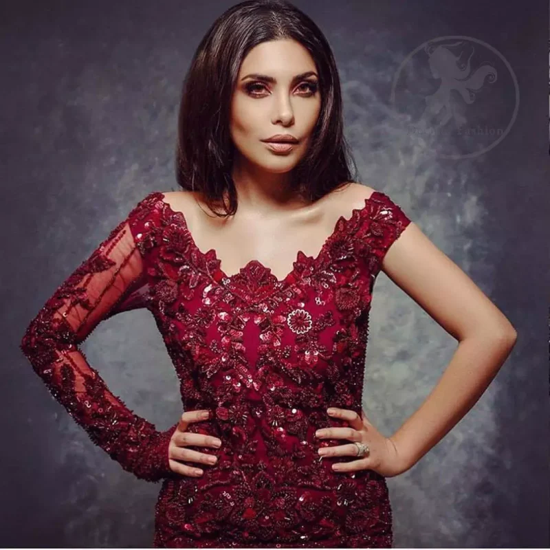 This outstanding maroon short shirt fully embellished with floral embroidery. It is allured with maroon antique shaded kora, dabka , kundan, tilla and sequins. It is beautifully paired up with maroon embroidered bell bottom trouser.It comes with chiffon dupatta sprinkled with sequins all over.