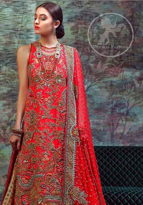 This dress is beautifully sculptured with floral thread embroidery. The halter shaped neckline meticulously highlighted with antique shaded kora, dabka, tilla, sequins and pearls. The shirt is ornamented with multiple color thread embroidered applique. It comes with chiffon dupatta which has four sided embellished border and sprinkled with sequins all over it. It is beautifully paired up with brocade sharara.