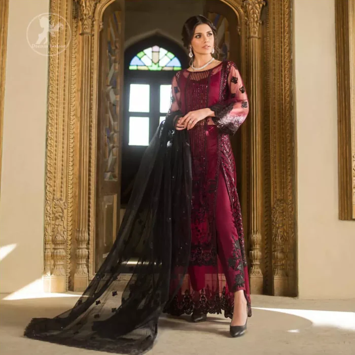 Boost your confidence and style in this glamorous attire accentuated with finest thread work embroidery and cut work borders. Pair it up with embroidered straight pants. It comes with black embroidered dupatta that gives the right amount of glamour to the outfit.