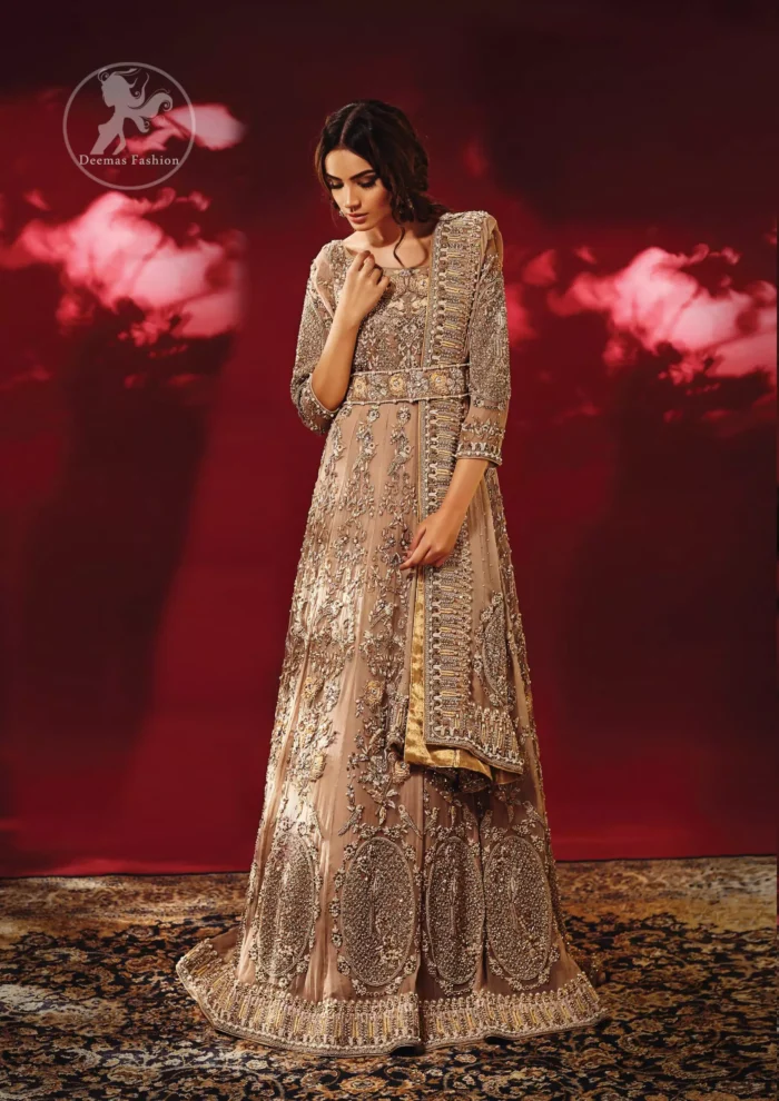 Redefine your style in this traditional and versatile ensemble ornamented with floral and geometric embroidery furnished with antique shaded kora dabka kundan and pearls. It comes with brocade cigarette pants. It is stunningly coordinated with antique brass dupatta with embellished borders on all sides and sequins spray all over.