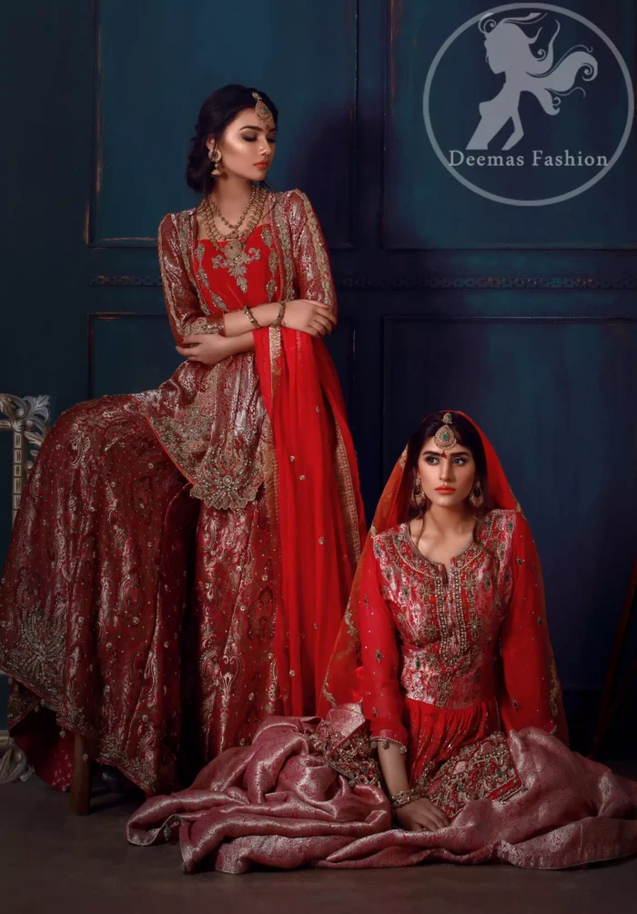 This dress is beautifully decorated with heavy embroidery. It is highlighted with kora, dabka, tilla, sequins and pearls. It comes with embroidered gharara. It is coordinated with chiffon dupatta which is sprinkled with sequins all over it. It is further furnished with four sided frilled lace.