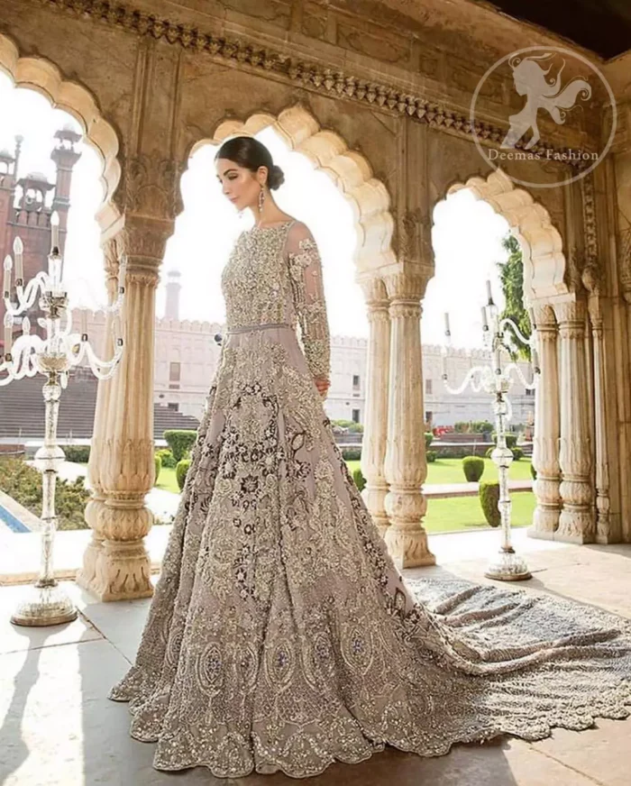 Redefine your style in this traditional and versatile ensemble ornamented with floral and geometric pattern embroidery furnished with kora, dabka, tilla, sequins, kundan, and pearls. It comes with brocade pajama. It is stunningly coordinated with Chiffon dupatta with embellished borders on all sides and sequins spray all over it.