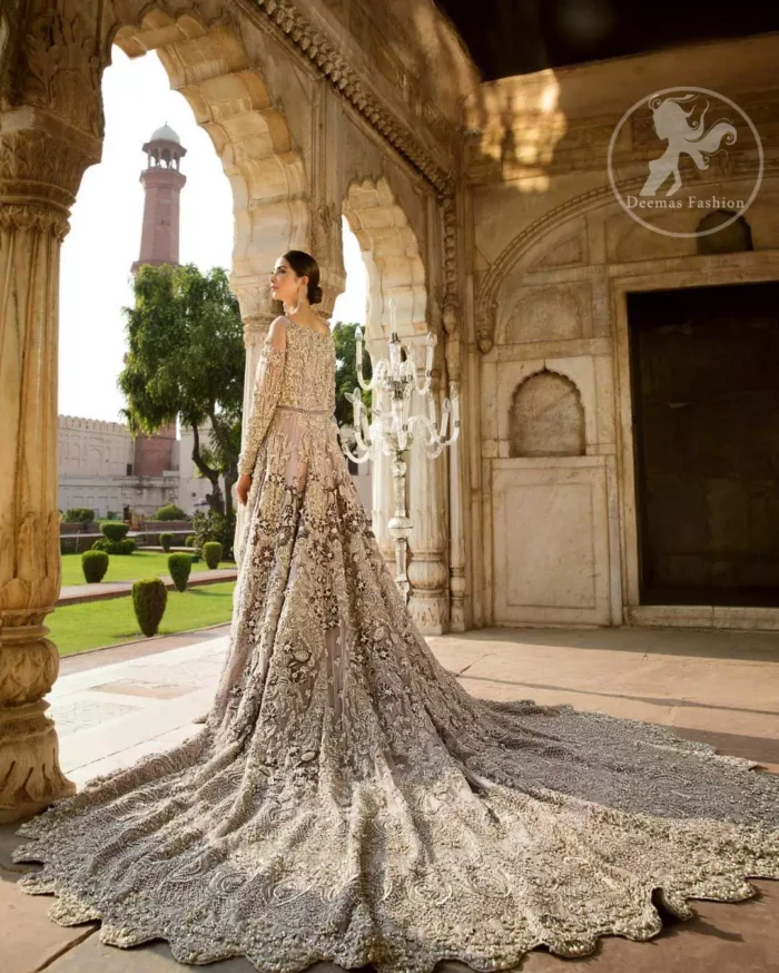 Redefine your style in this traditional and versatile ensemble ornamented with floral and geometric pattern embroidery furnished with kora, dabka, tilla, sequins, kundan, and pearls. It comes with brocade pajama. It is stunningly coordinated with Chiffon dupatta with embellished borders on all sides and sequins spray all over it.