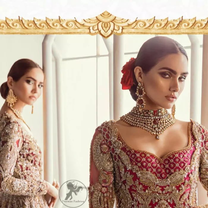 This bridal dress is perfect for your special day. Beautifully decorated with floral embroidery and embellished scalloped border. It is adorned with kora, dabka, tilla, sequins and pearls. It comes with an exquisite lehengha with thick embroidered border to give it a regal look. Dupatta comprises of floral thread embroidery allured with thick embellished border.
