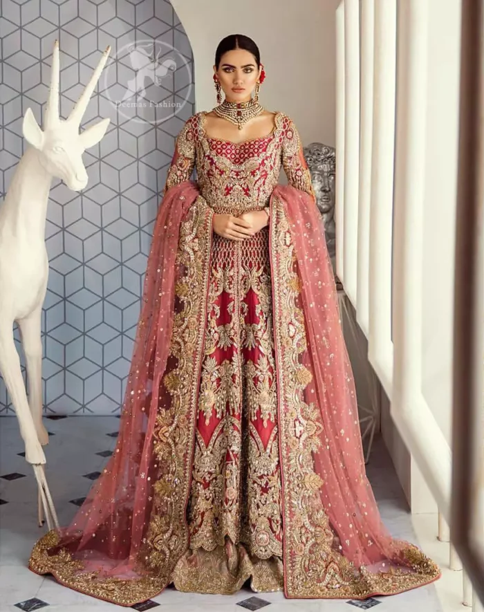 This bridal dress is perfect for your special day. Beautifully decorated with floral embroidery and embellished scalloped border. It is adorned with kora, dabka, tilla, sequins and pearls. It comes with an exquisite lehengha with thick embroidered border to give it a regal look. Dupatta comprises of floral thread embroidery allured with thick embellished border.