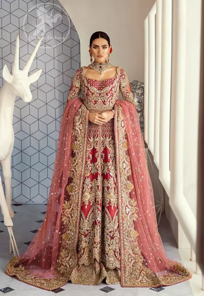 This bridal dress is perfect for your special day. Beautifully decorated with floral embroidery and embellished scalloped border. It is adorned with kora, dabka, tilla, sequins and pearls. It comes with an exquisite lehengha with thick embroidered border to give it a regal look. Dupatta comprises of floral thread embroidery allured with thick embellished border.