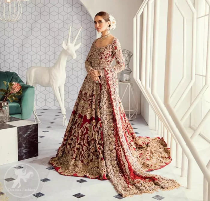 Look alluring in this floor length frock embellished with kora dabka, tilla, swarovsky and pearls. It has intricate embroidered motifs and detailed bodice. The border on the daman is enhanced with embellished floral pattern detailing that instantly draws attention. Heavy back trail frock adds to the look. It comes with matching pajama. It is paired up with heavy embroidered dupatta.