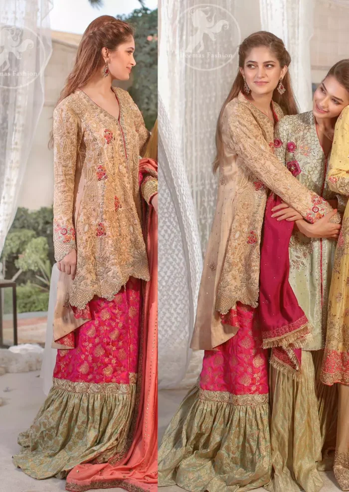 This super stunning back trail shirt is made of rich floral embroidery which is further enhanced with zerdosi work. It is finished with scalloped embellished border all around the shirt. Back of the shirt is decorated with small sized sprinkled motifs all over. The outfit is coordinated with shocking pink & pale green traditional gharara.