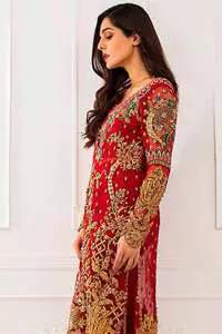 This dress is beautifully sculptured with floral embroidey, adorned with cutwork borders, colorful embellishments and zerdozi work. The detailed scalloped border gives a perect ending to this shirt. Having full length sleeves and small sprinkled motifs on ground. Paired up with red capri pants and comprises with red dupatta.