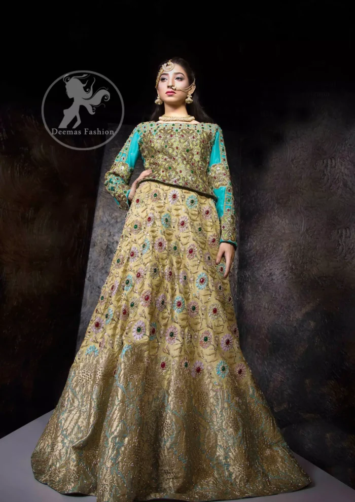 This outfit is adorned with kora, dabka, tilla, sequins and pearls. It is decorated with heavy floral embellishments. It comes with heavy embellished lehengha. A tissue dupatta accompanies the garment. The dupatta has embellished borders on all four sides and sequins spray all over it. The garment is lined with medium silk and finished with jamawar piping.