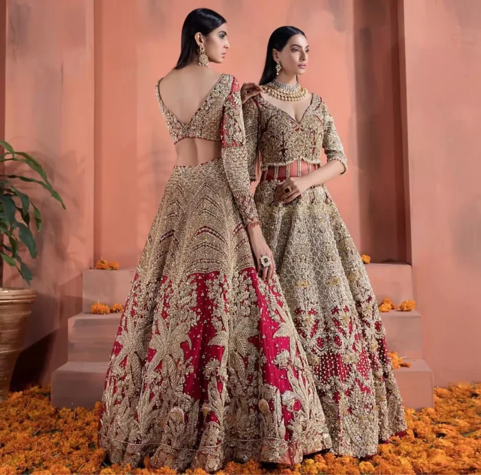 Captured in traditional silhouette, The bridal stands out due to its uniqueness and the perfect fusion of modern cut and traditional embroidery. This dress is beautifully decorated with heavy embroidery. It is highlighted with kora, dabka, tilla, sequins and pearls. Blouse is enhanced with zardosi work on neckline. It comes with full embellished lehenga adorned with applique, floral motifs and sequins spray all over it. It is coordinated with tissue dupatta which is sprinkled with sequins all over it. It is further furnished with four sided scalloped border.