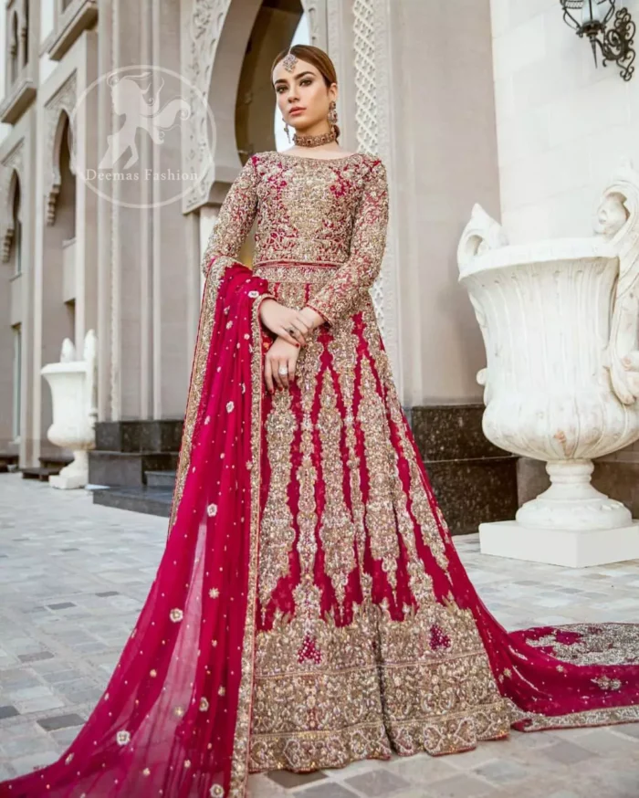 Delicately crafted and personifying chic elegance with an element of grandiose.  Heavily embellished in the front with intricate embroidered pattern done with dull golden kora, dabka, kundan, tilla and sequins. The lehnga with embroidered motifs pattern all over and finished with thick kora and dabka borders completes the look. It is coordinated with tissue dupatta which is sprinkled with sequins all over it. It is further furnished with four sided embroidered border.