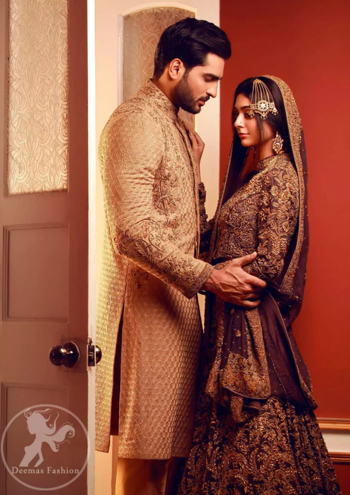This outfit is adorned with kora, dabka, tilla, sequins and pearls. It is decorated with heavy antique shaded floral embellishments. It comes with heavy embellished lehengha  which has thick border on hemline. A magenta chiffon dupatta accompanies the garment. The dupatta has embellished borders on all four sides and small floral motifs all over it. The garment is lined with medium silk and finished with jamawar piping.