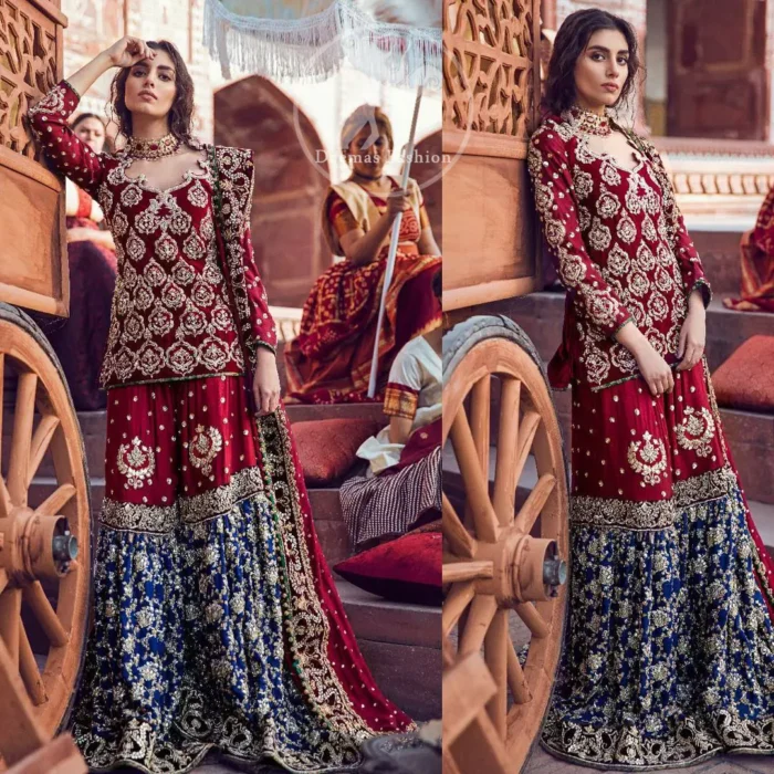 A beautiful short shirt heavily embellished with silver work enhanced with kora, dabka, tilla, sequins and stones. It is artistically coordinated with blue jamawar farshi gharara with floral embellished pattern at the bottom and finished with an appliqued embellished border. It is beautifully coordinated with jamawar dupatta sprinkled with small motifs andan appliqued border finished around dupatta.