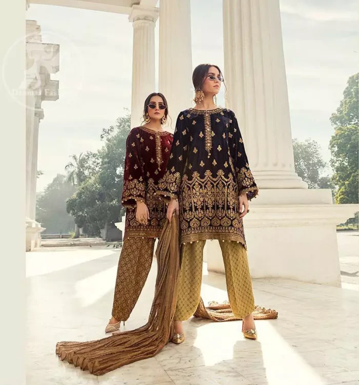 This dress is beautifully decorated with floral embrroidey. Decorated with mesmerizing antique gold kora, dabka and zardozi embellished neckline border and sleeves. Our maroon velvet shirt will add glamour to your style. Delicate tassels adds to the bling. It comes with jamawar shalwar. Dupatta is of tissue fabric.