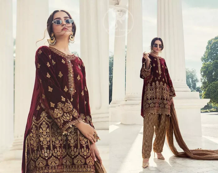 This dress is beautifully decorated with floral embrroidey. Decorated with mesmerizing antique gold kora, dabka and zardozi embellished neckline border and sleeves. Our maroon velvet shirt will add glamour to your style. Delicate tassels adds to the bling. It comes with jamawar shalwar. Dupatta is of tissue fabric.
