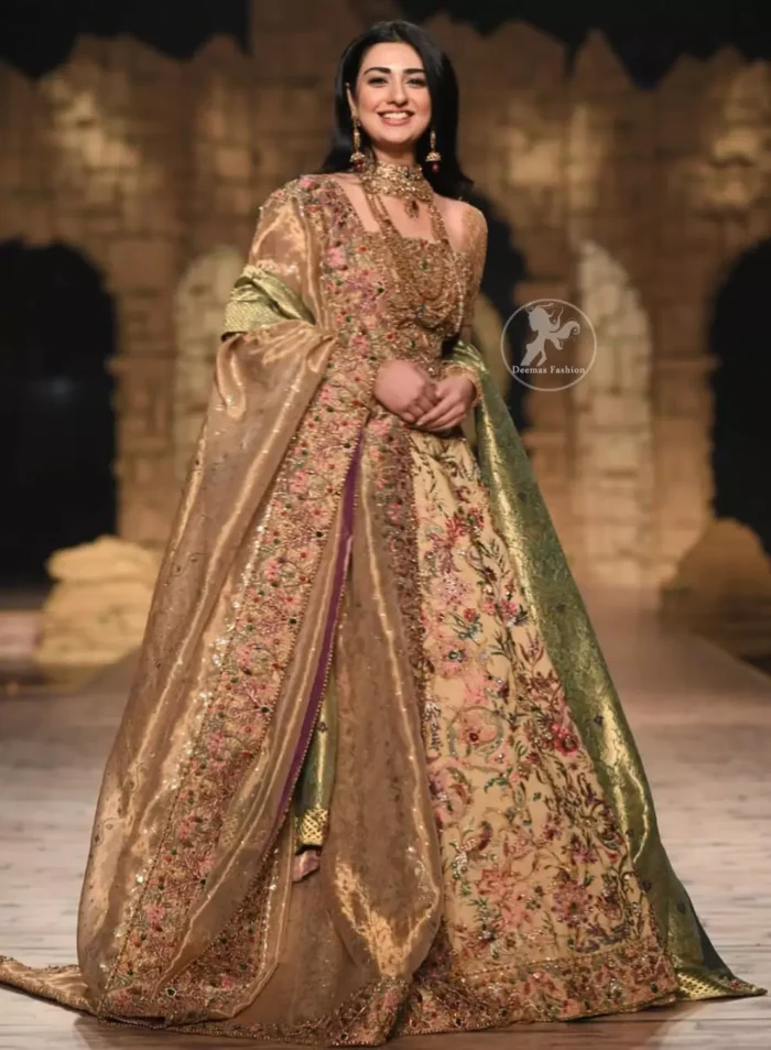 Modern yet traditional: This regal muddy waters maxi is an immensely captivating traditional piece, enhancing the art of classical heritage showcasing the craftsmanship of antique shaded kora, dabka & mukesh detailed with pearls; artistically embellished to give a beautiful rhythm to the outfit. Furthermore it is enhanced with multiple colored thread embroidery. It comes with brocade pajama. This outfit is paired with an ethereal bridal dupatta focusing on kora and dabka handwork borders on all four sides.