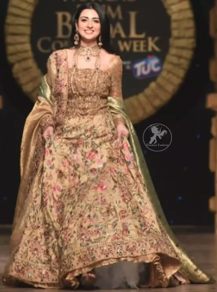 Modern yet traditional: This regal muddy waters maxi is an immensely captivating traditional piece, enhancing the art of classical heritage showcasing the craftsmanship of antique shaded kora, dabka & mukesh detailed with pearls; artistically embellished to give a beautiful rhythm to the outfit. Furthermore it is enhanced with multiple colored thread embroidery. It comes with brocade pajama. This outfit is paired with an ethereal bridal dupatta focusing on kora and dabka handwork borders on all four sides.