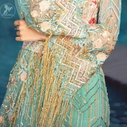 A must have creation for day to evening wear. Reflecting exuberant color play in this ethereal piece meticulously highlighted with