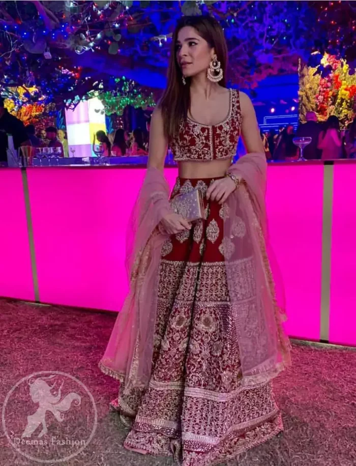 Steal the moment with our sepia brown blouse skirt emphasized with traditional embroidery and intricate floral embellishment enhanced with gold kora, dabka and sequins. It comes with heavy embellished lehenga which emphasized with different motifs and floral embroidery. It is coordinated with tissue dupatta which is sprinkled with sequins all over it.