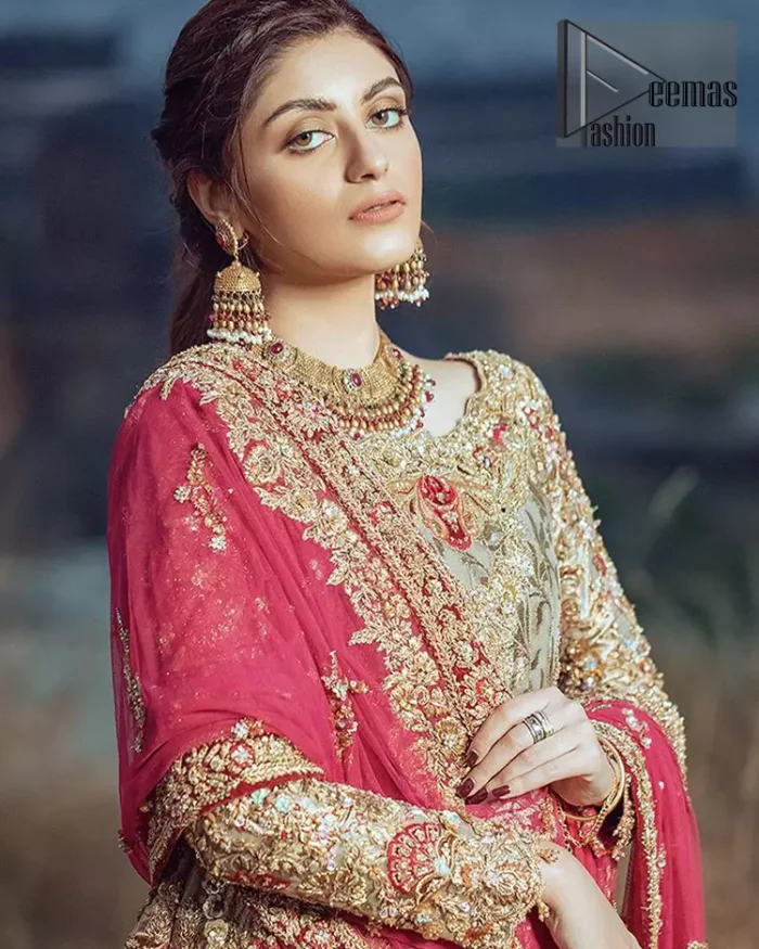 This dress is majestic beauty. A jacquard fabric maxi adorning personification of a majestic look with a contemporary silhouette showcasing the timeless art of zardosi, naqshi, kora, dabka and thread work, having full length scalloped sleeves with ethereally handcrafted golden zardosi work and resham embroidery. The bottom of the maxi is enhanced with rich floral embroidery and motifs pattern. It comprises with matching churidar pajama. The dupatta incorporates beautifully designed borders on all four sides, focusing on the heavily embellished pallu borders to give it a perfect maharani look.