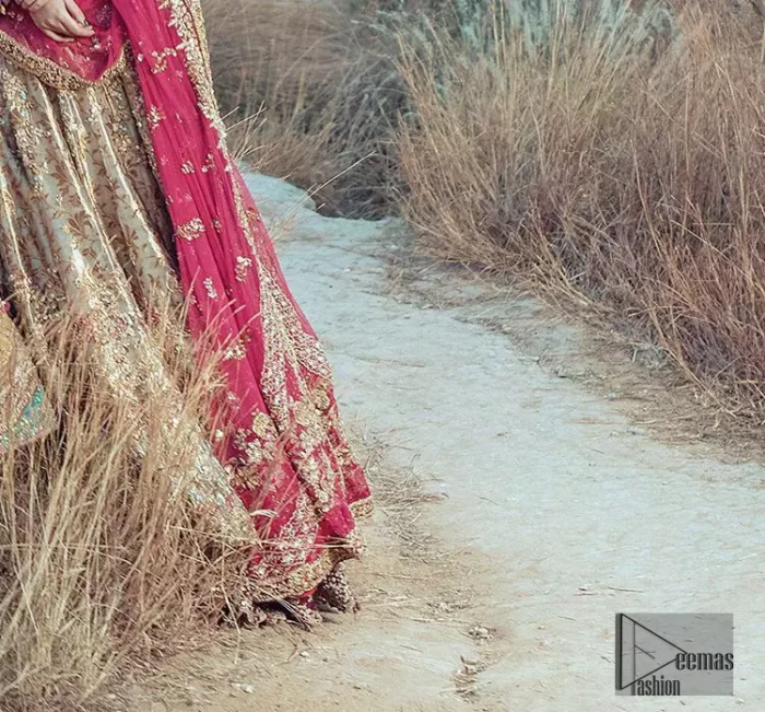 This dress is majestic beauty. A jacquard fabric maxi adorning personification of a majestic look with a contemporary silhouette showcasing the timeless art of zardosi, naqshi, kora, dabka and thread work, having full length scalloped sleeves with ethereally handcrafted golden zardosi work and resham embroidery. The bottom of the maxi is enhanced with rich floral embroidery and motifs pattern. It comprises with matching churidar pajama. The dupatta incorporates beautifully designed borders on all four sides, focusing on the heavily embellished pallu borders to give it a perfect maharani look.